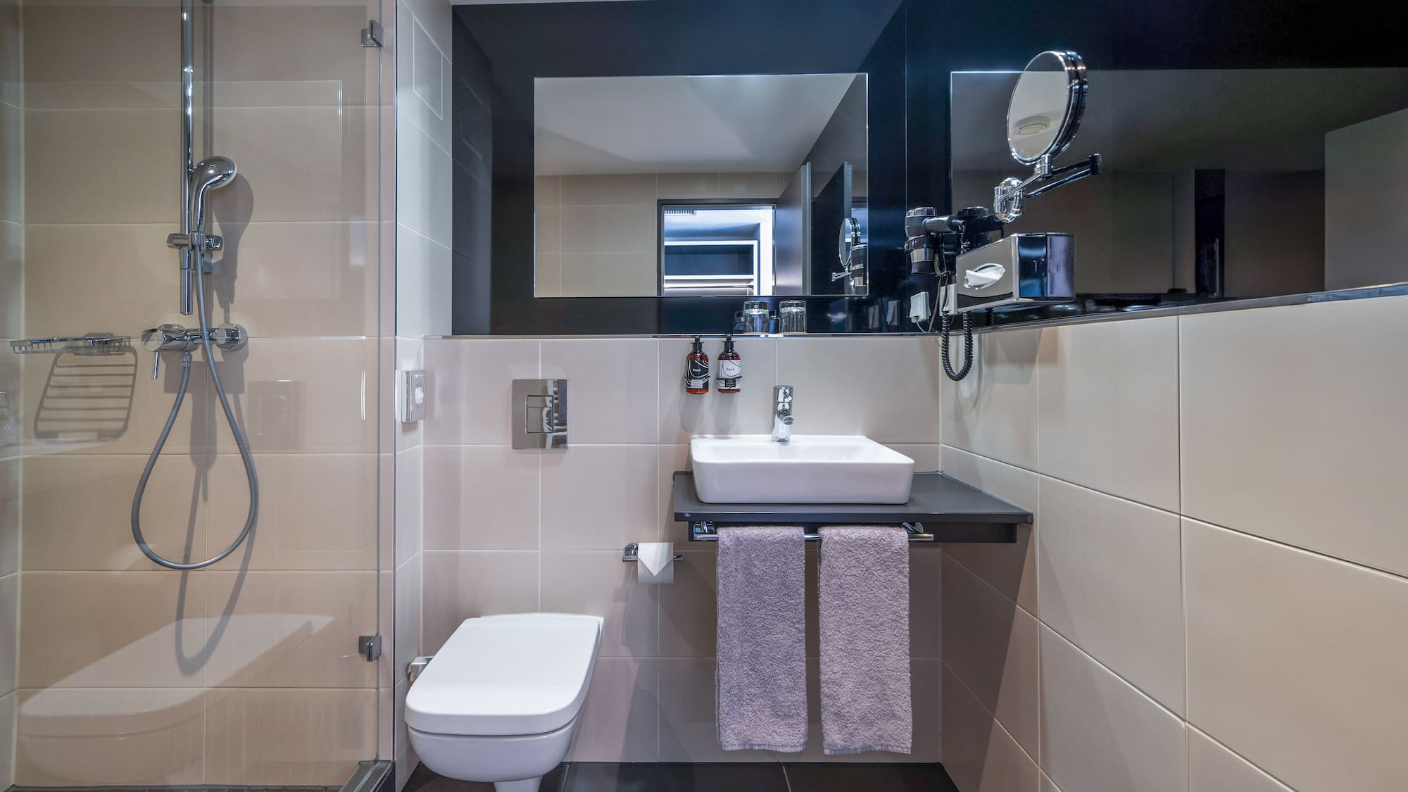 a bathroom with a sink and shower