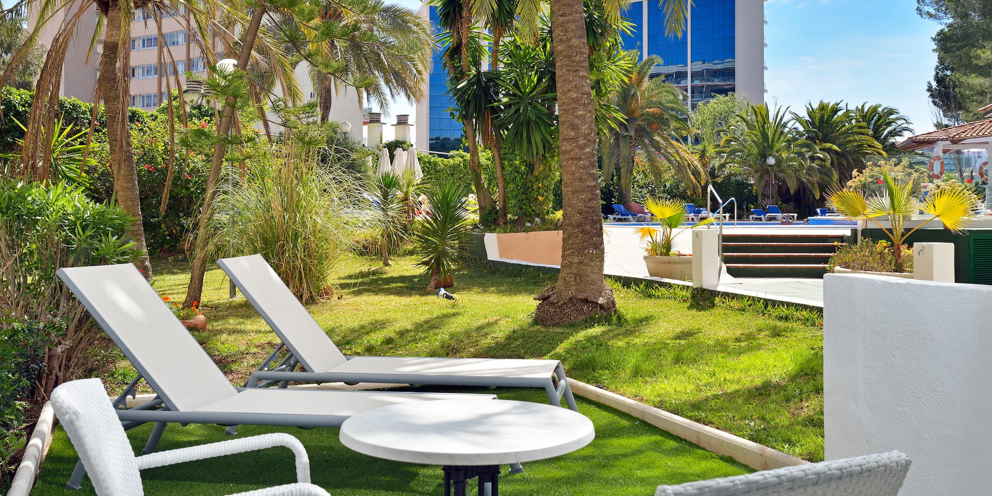 chairs and tables in a yard