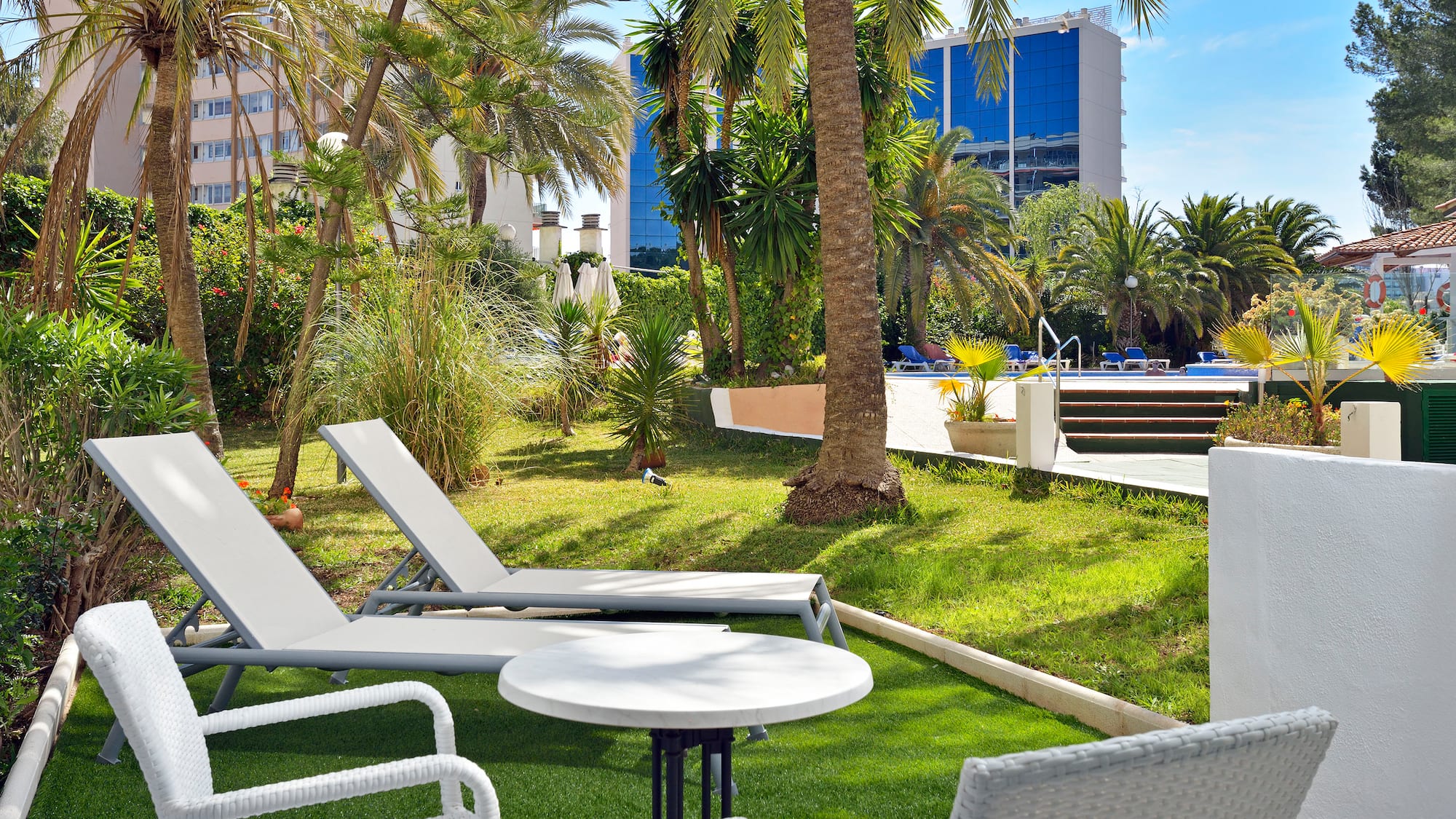 chairs and tables in a yard
