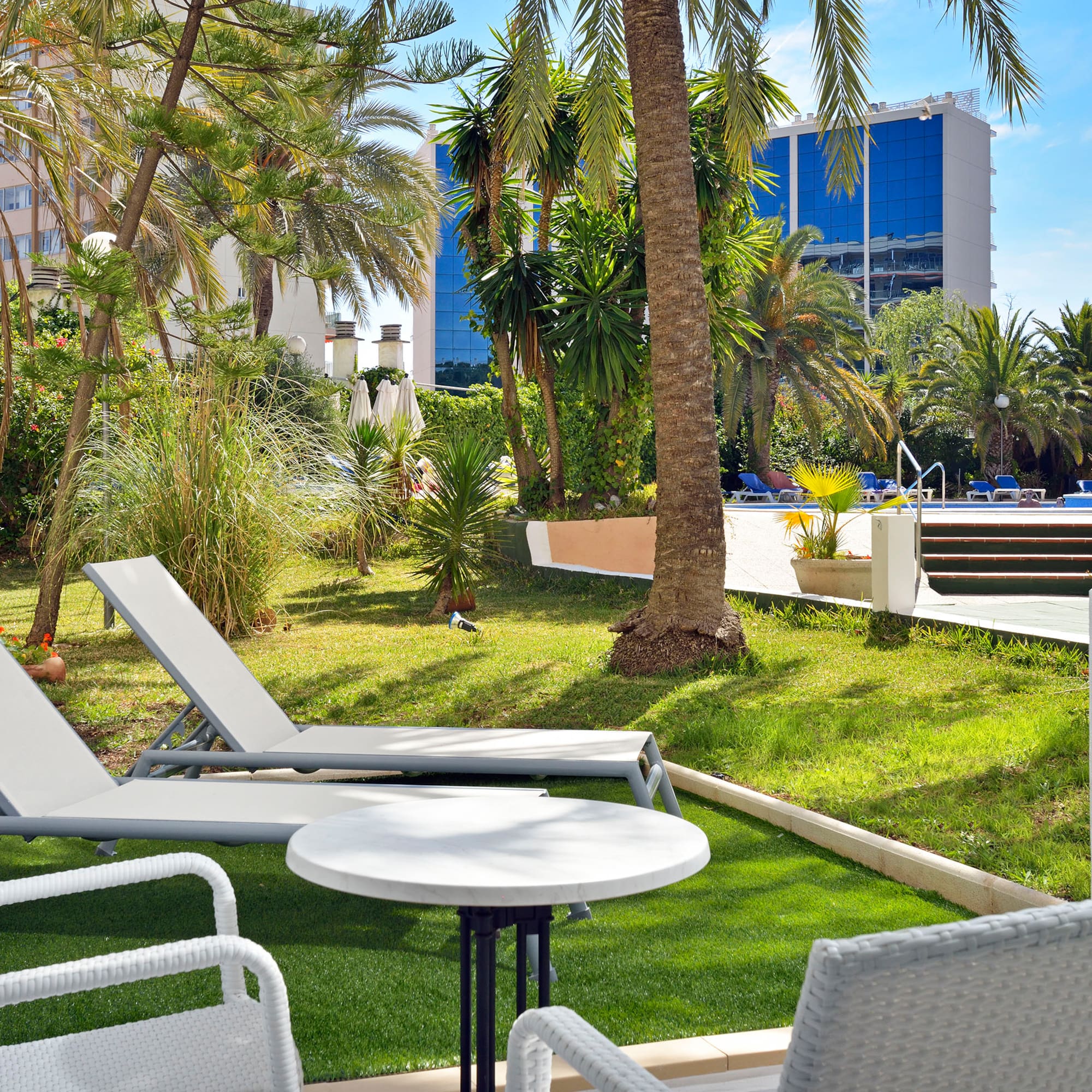 chairs and tables in a yard