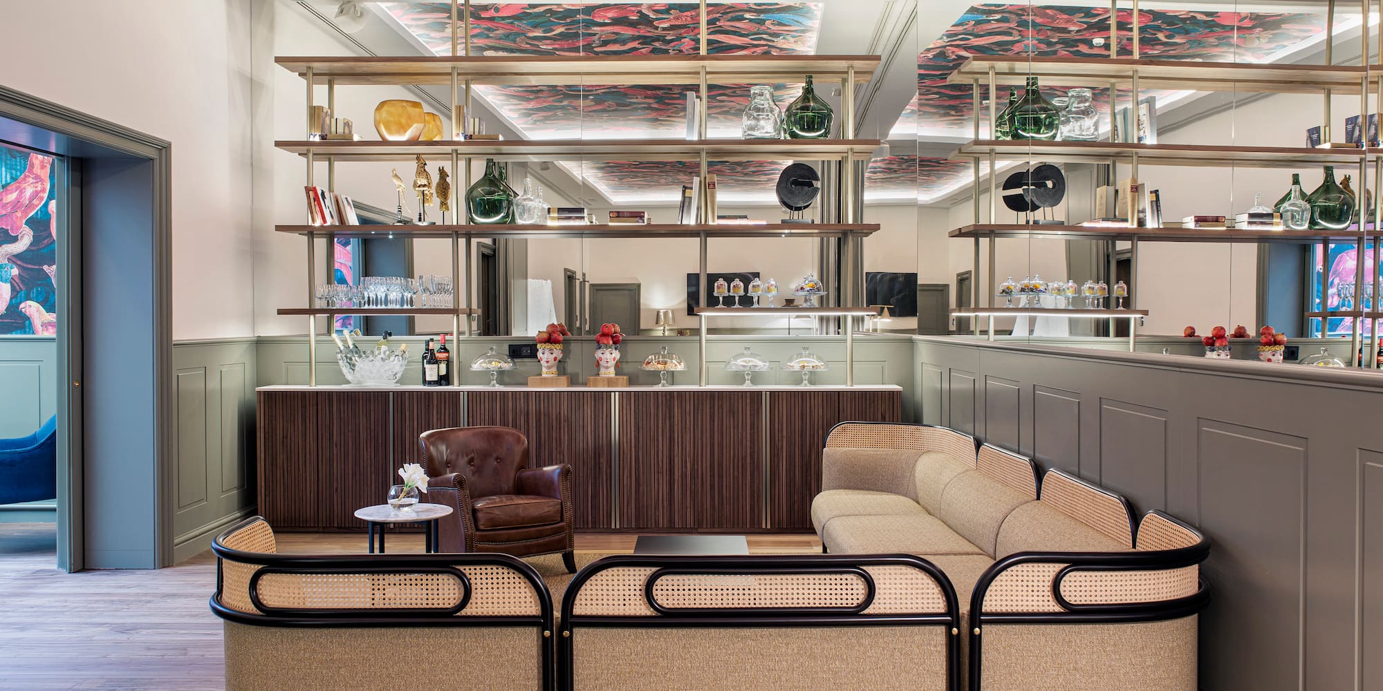 a room with a couch and a bar