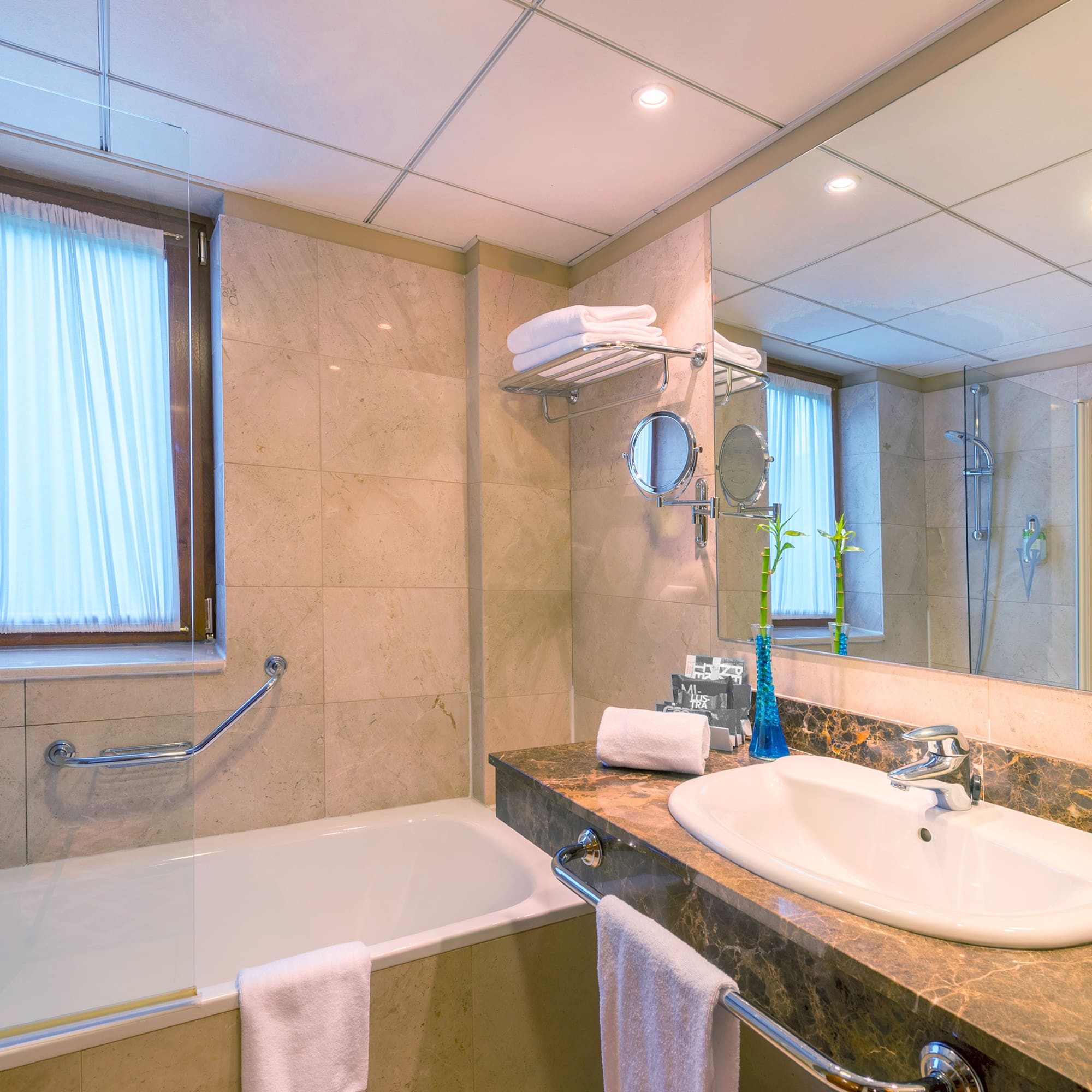 a bathroom with a bathtub and sink