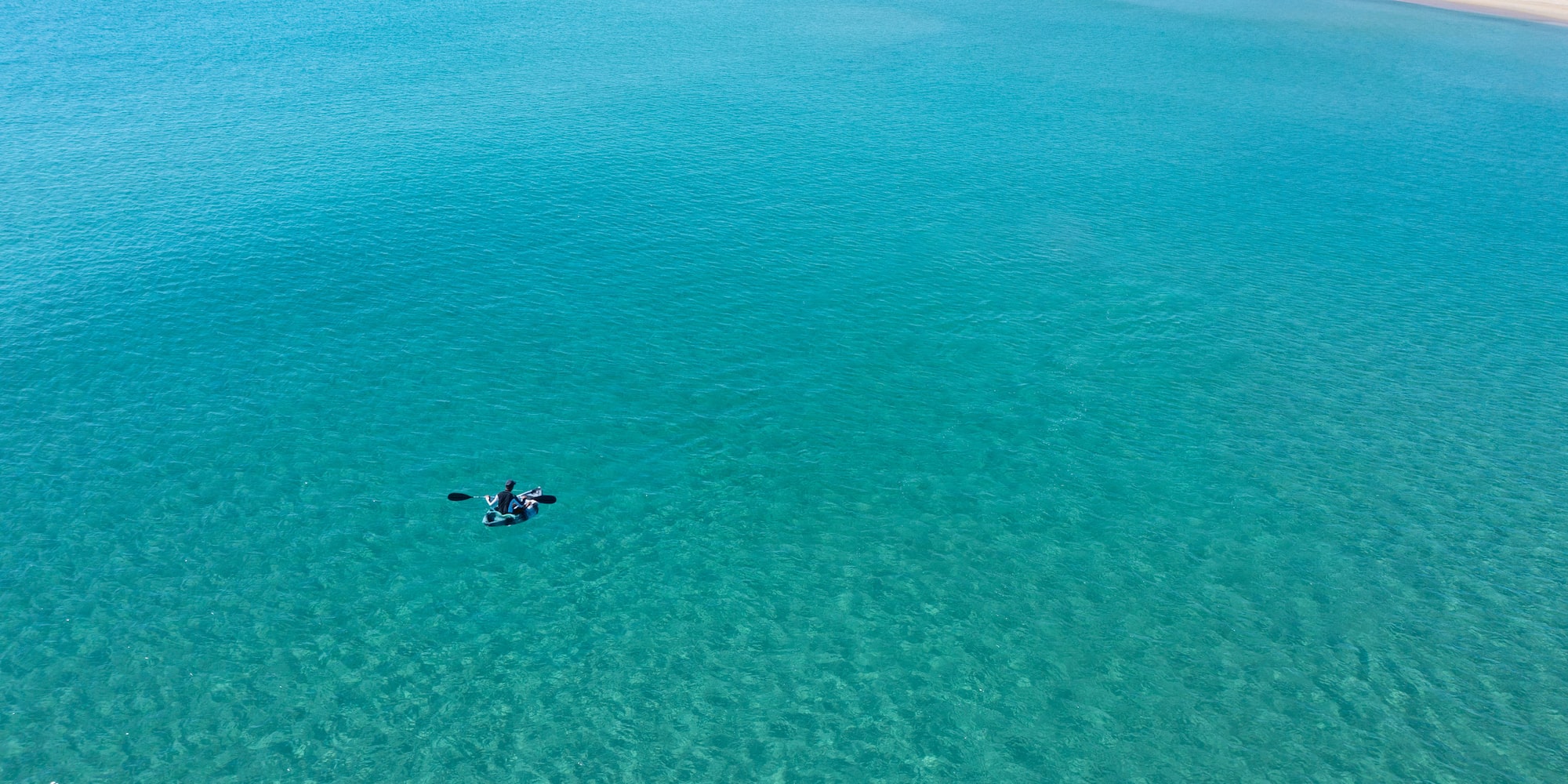 a person in a kayak in the water