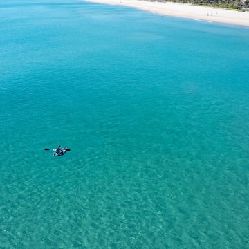 a person in a kayak in the water