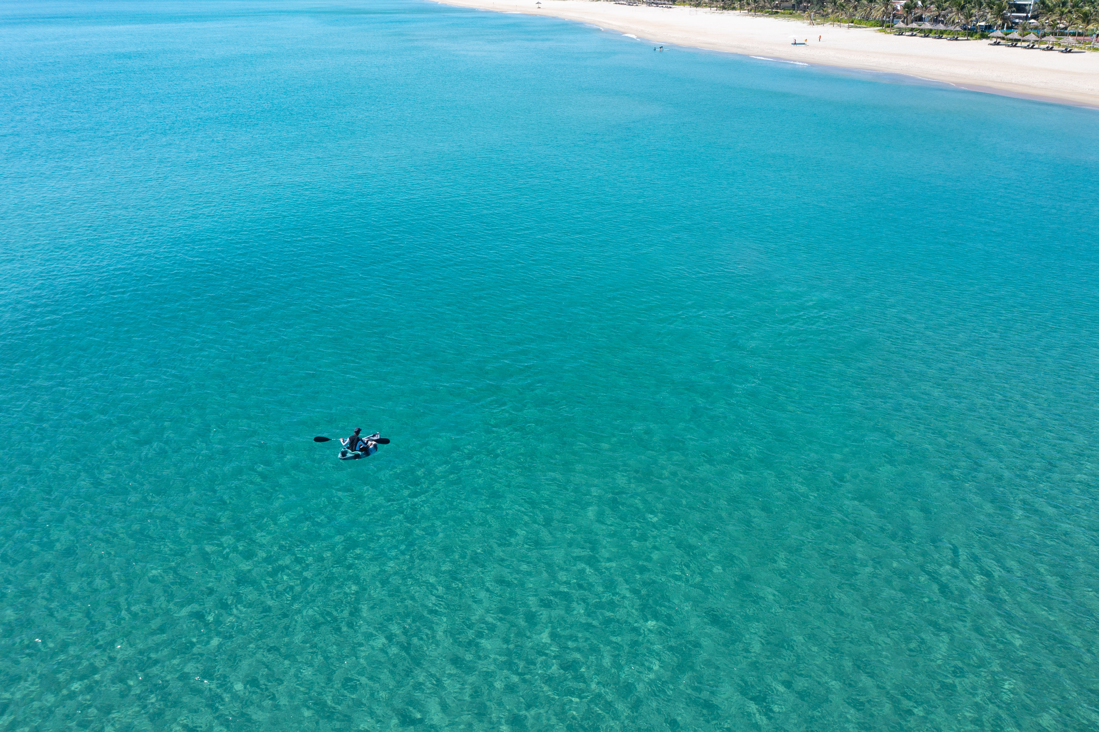 a person in a kayak in the water