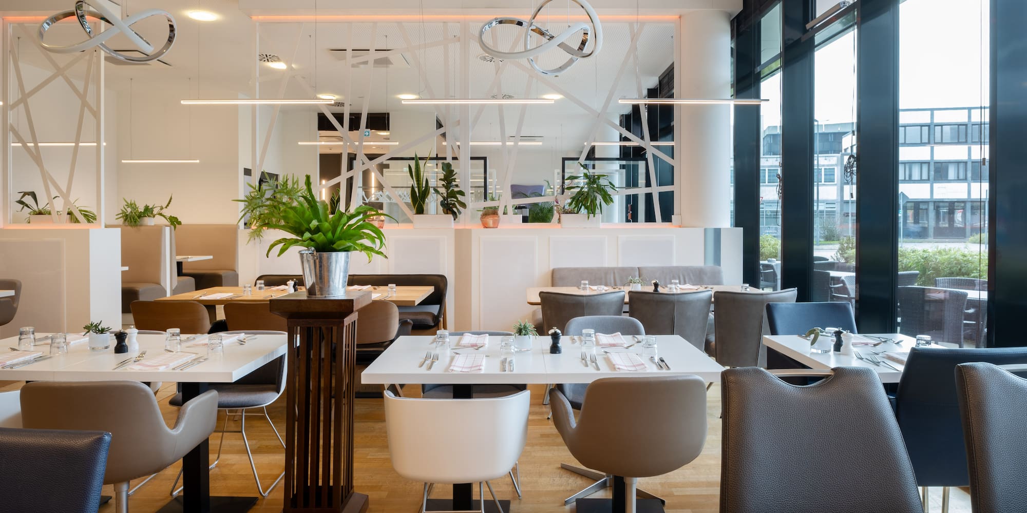 a restaurant with tables and chairs