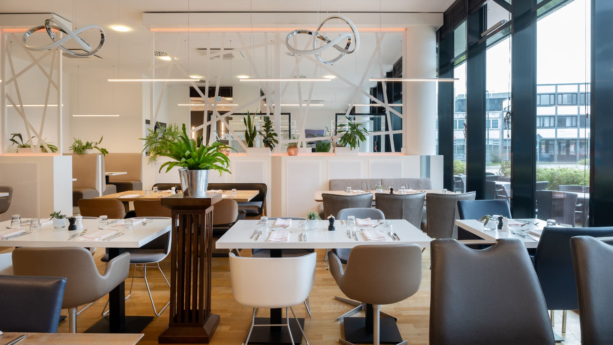 a restaurant with tables and chairs