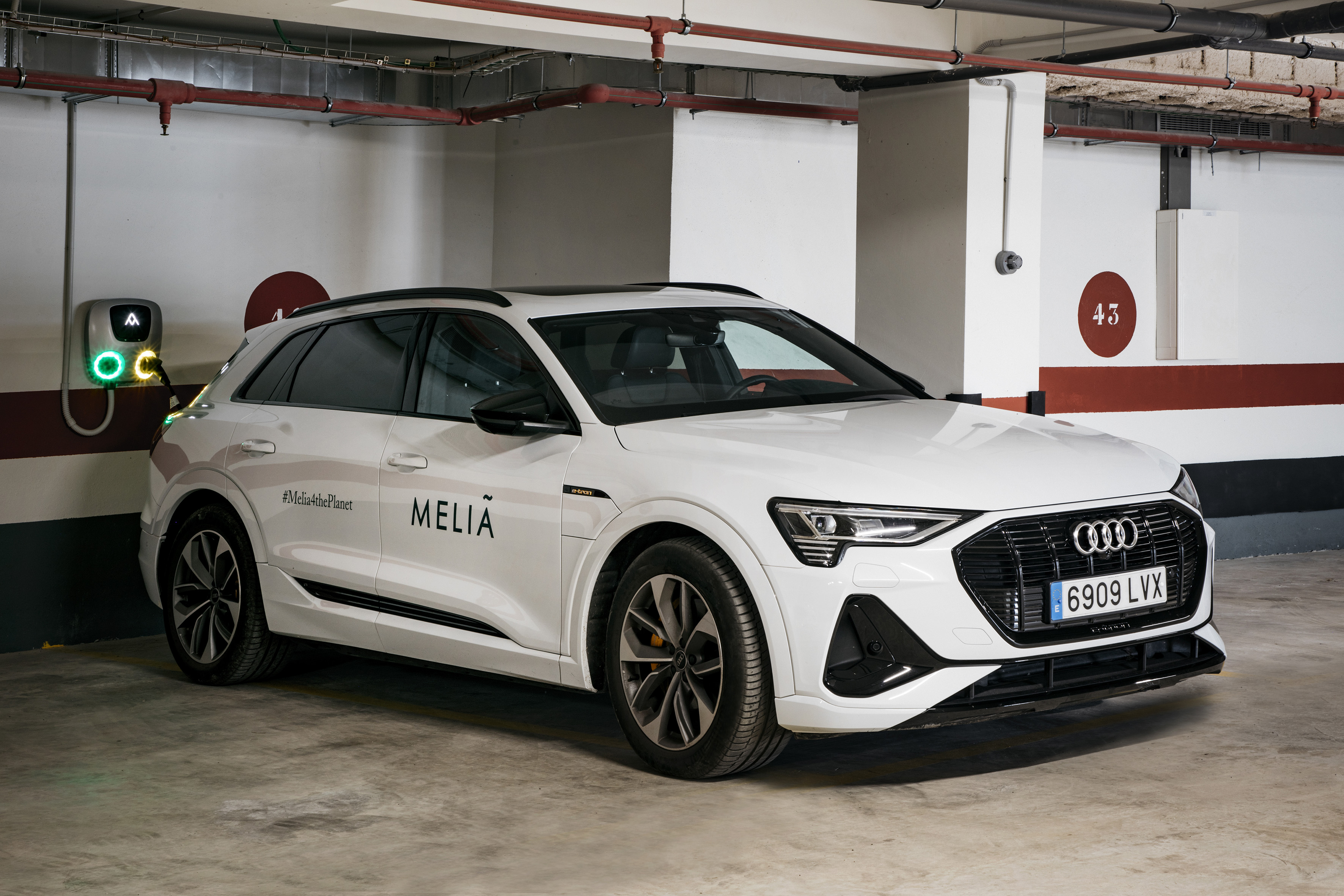 a white car parked in a parking lot