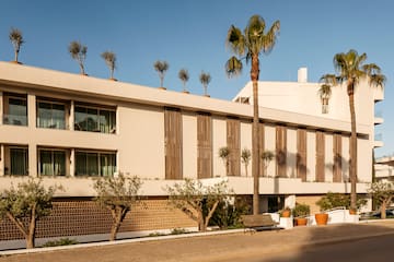 a building with trees on top of it