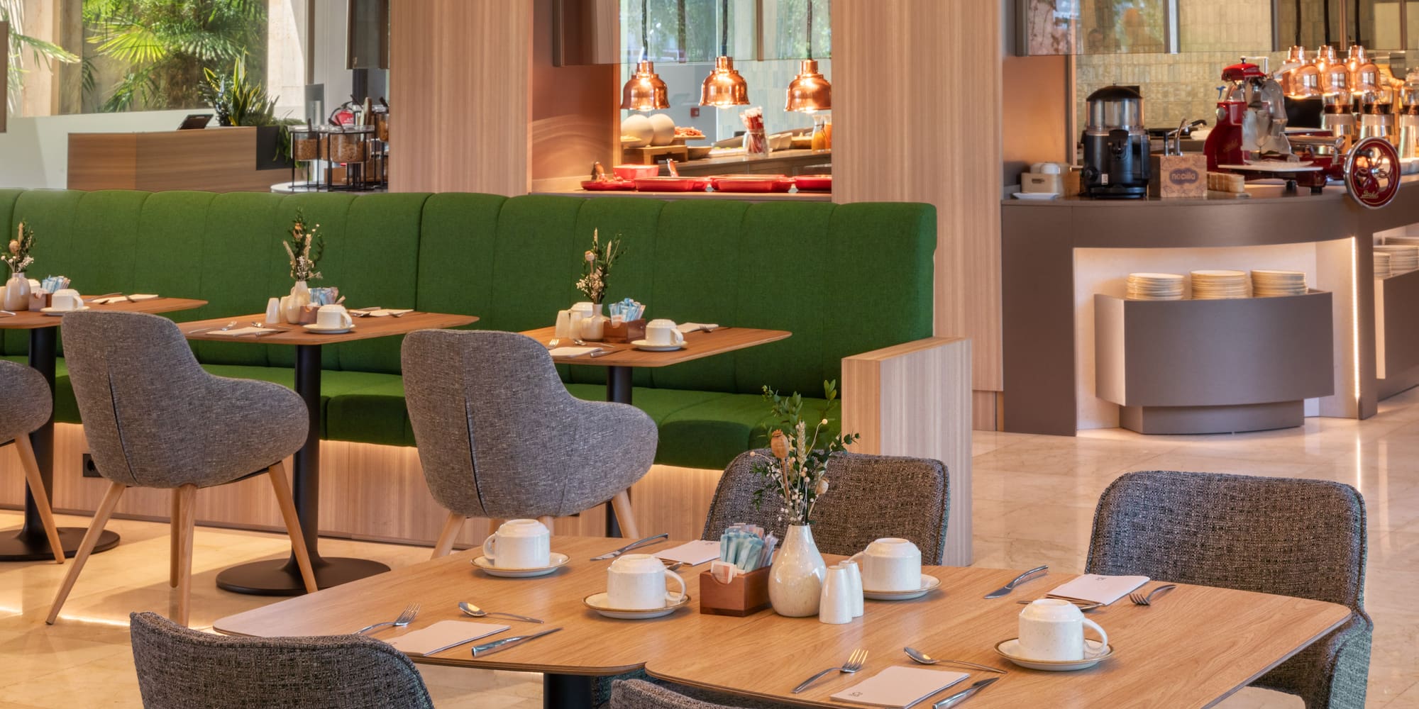 a restaurant with tables and chairs