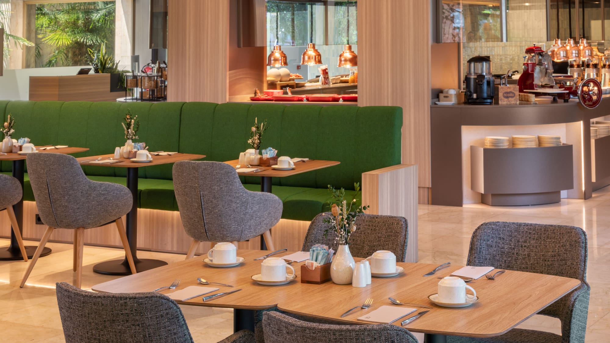 a restaurant with tables and chairs