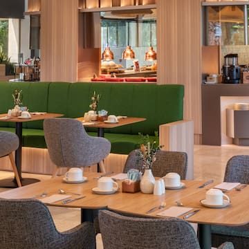 a restaurant with tables and chairs