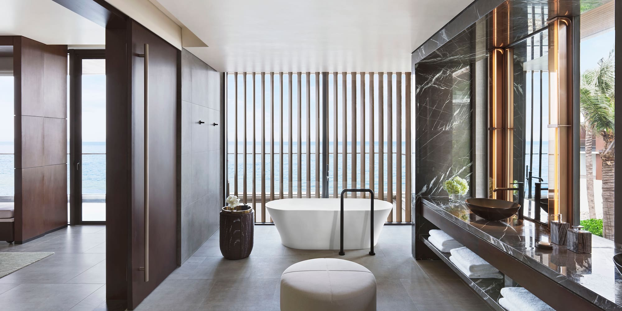 a bathroom with a tub and a sink