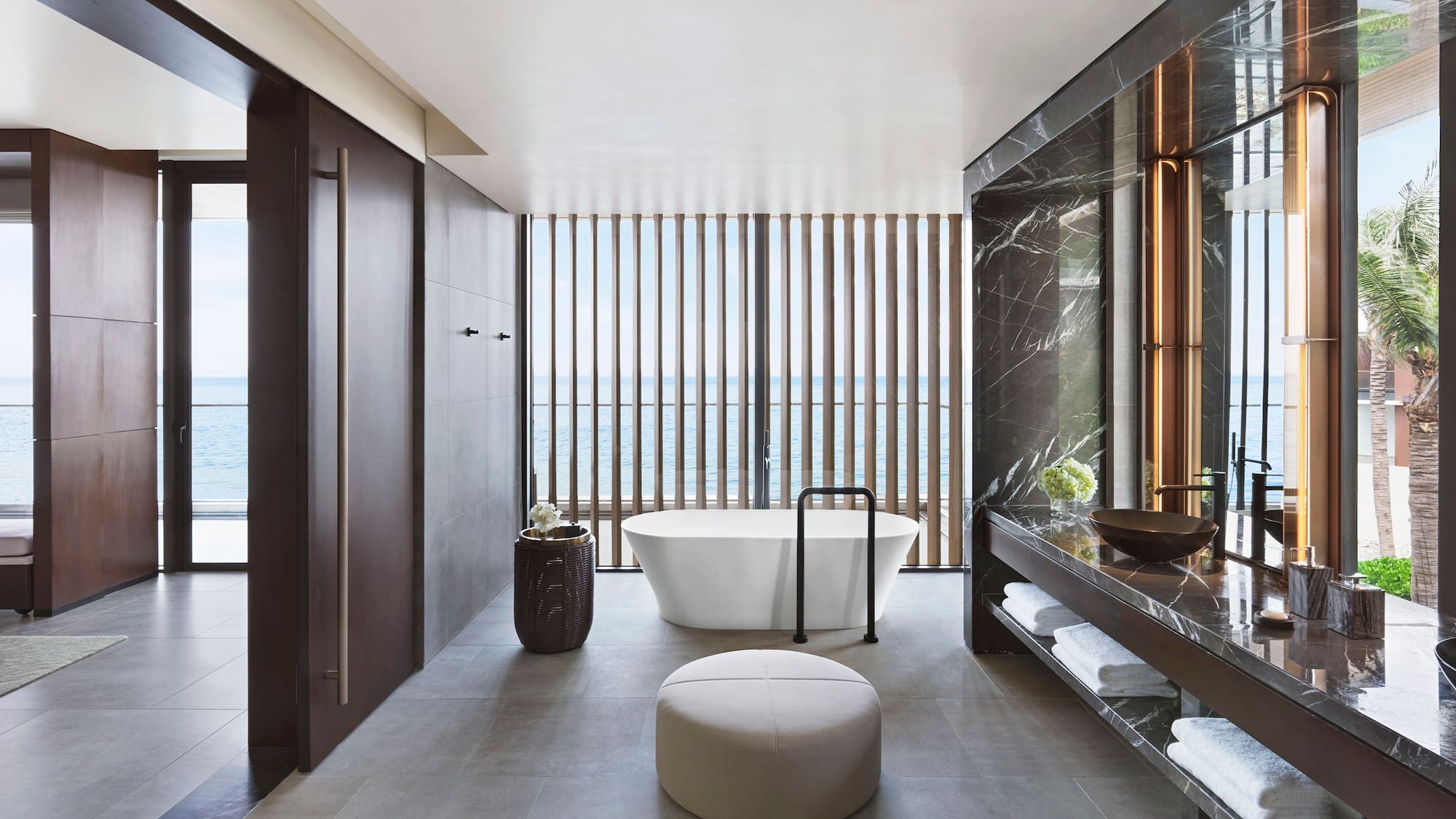 a bathroom with a tub and a sink