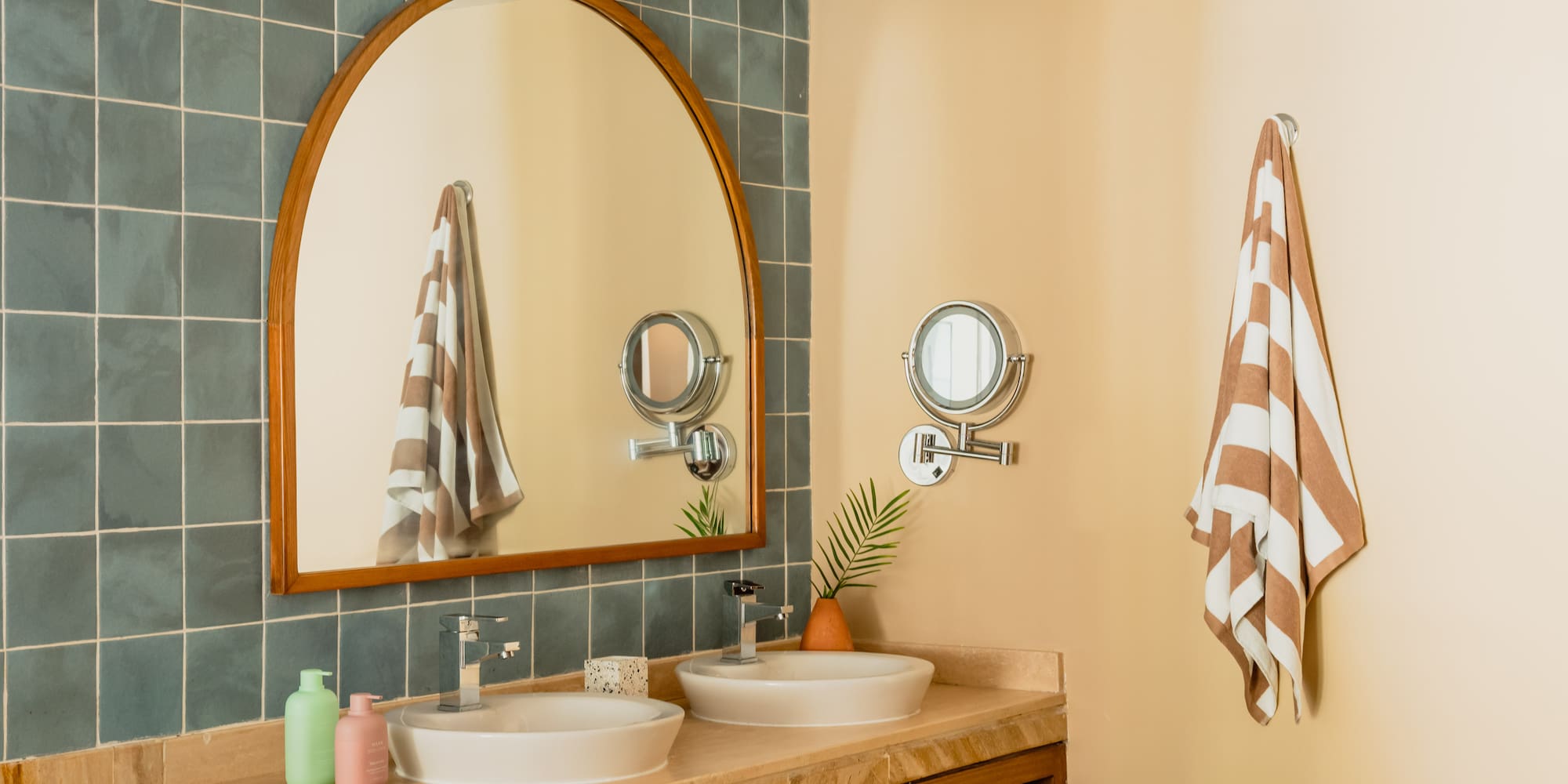 a bathroom with a mirror and sink
