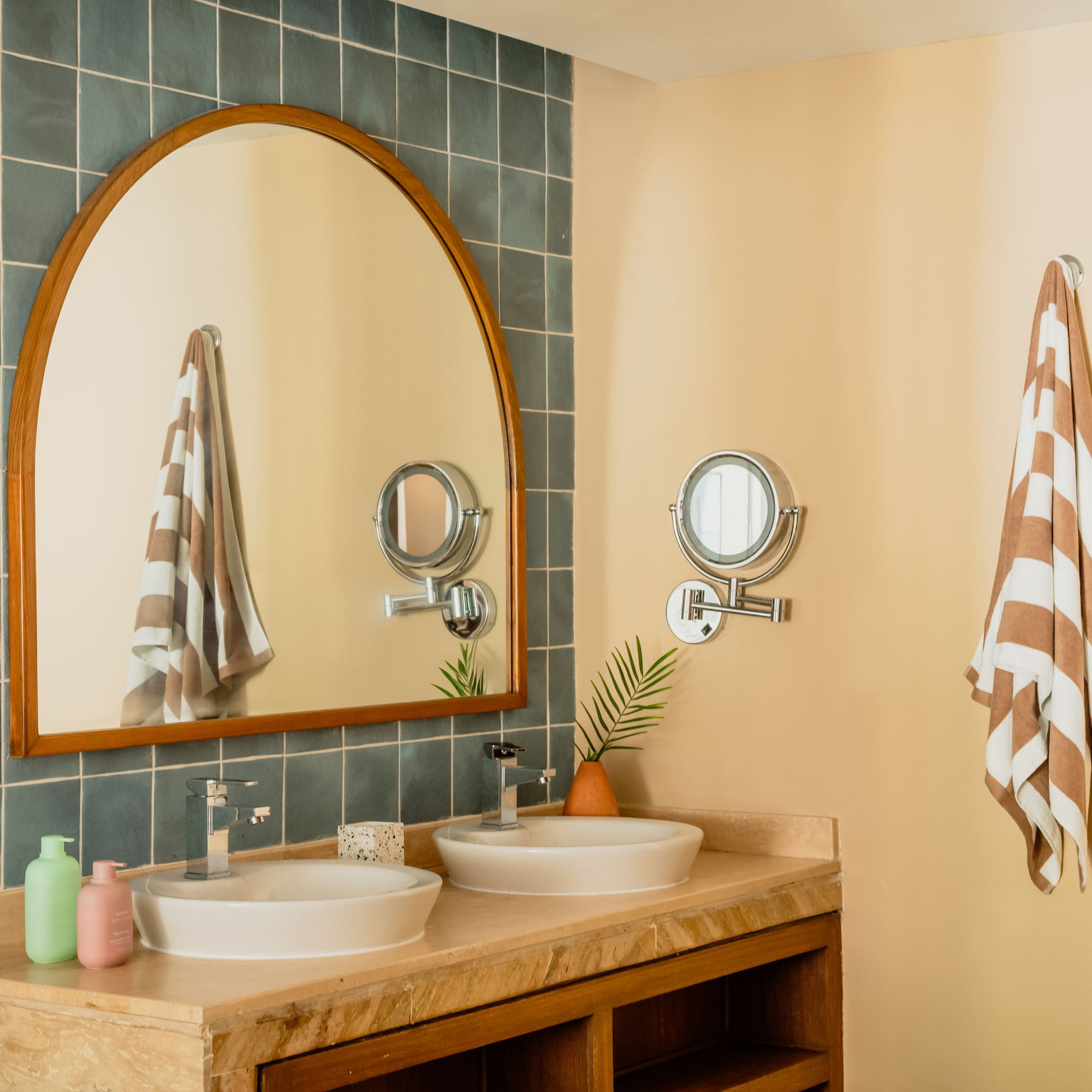 a bathroom with a mirror and sink