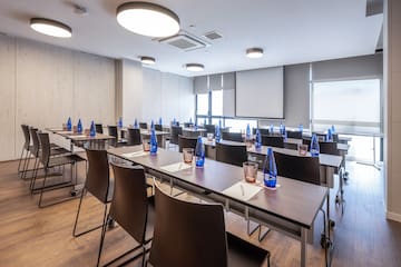 a room with tables and chairs