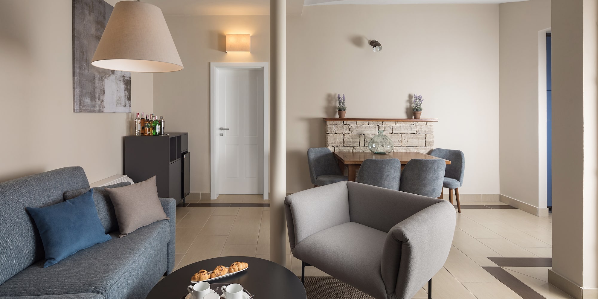 a living room with a couch and a table