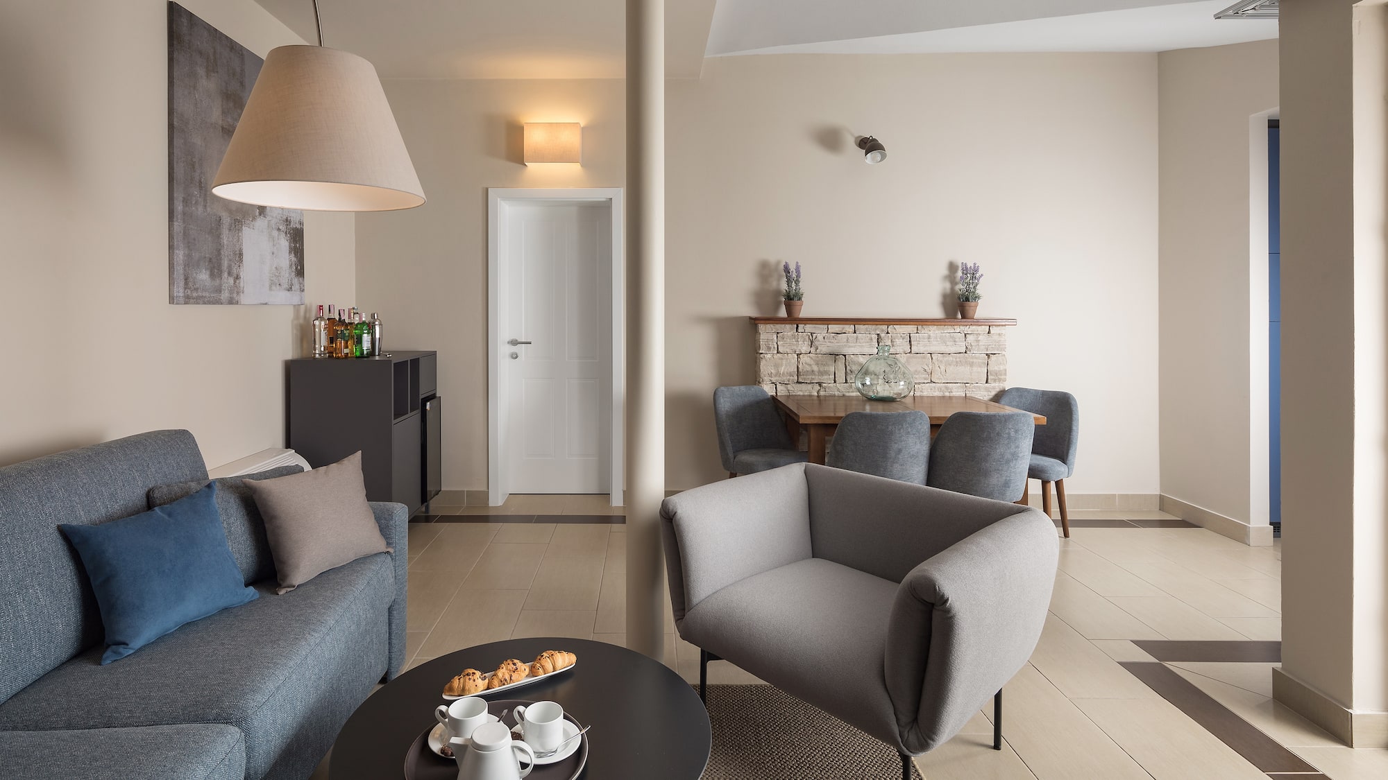 a living room with a couch and a table