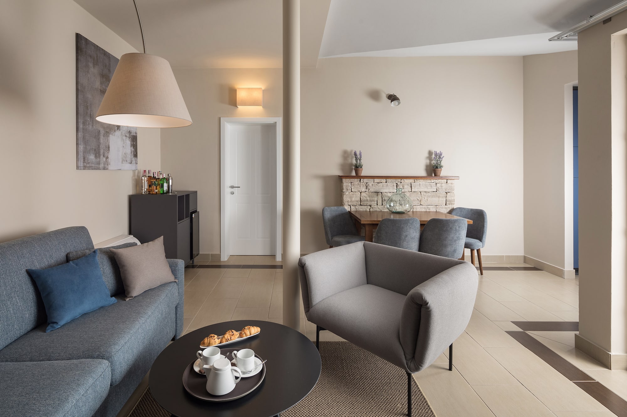 a living room with a couch and a table