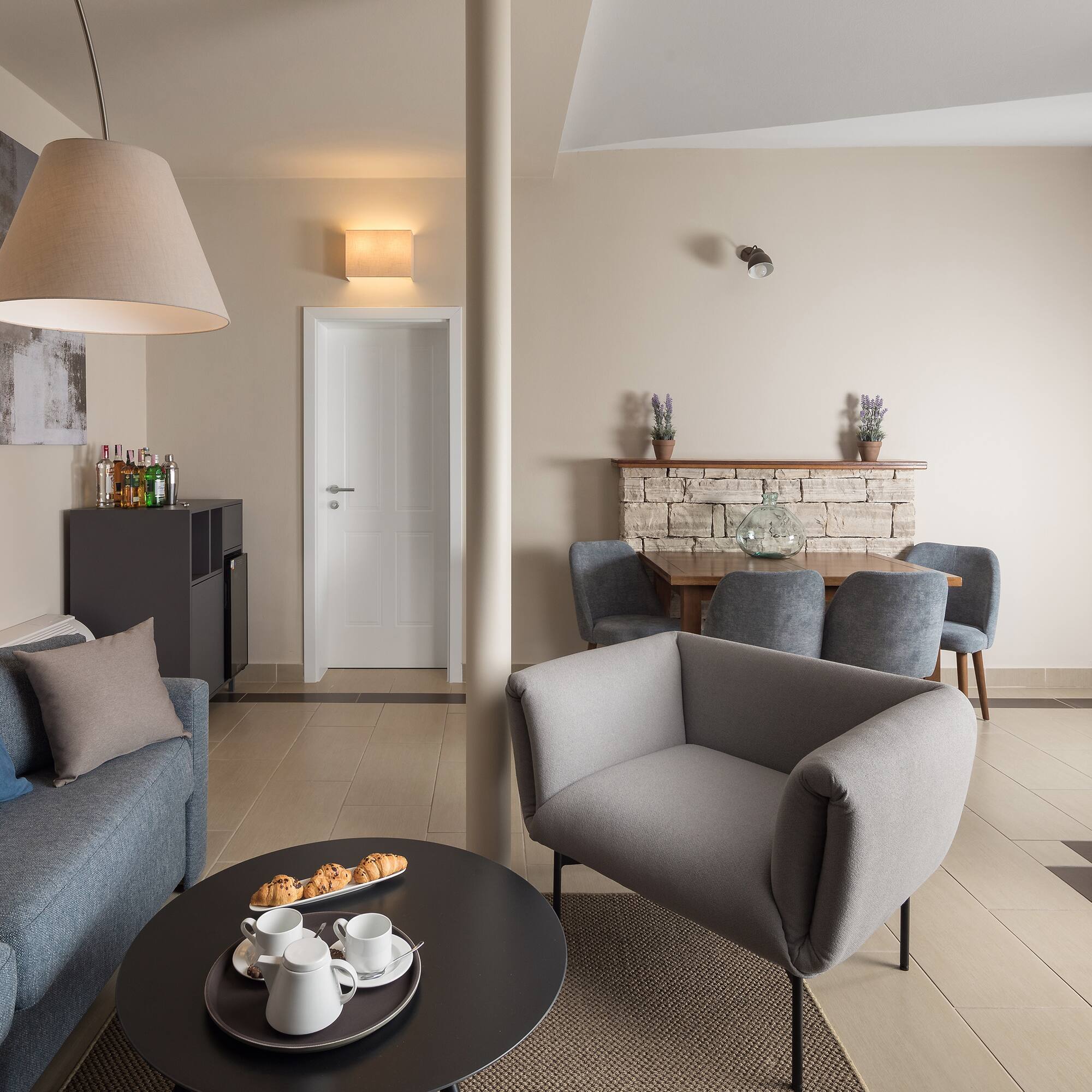 a living room with a couch and a table