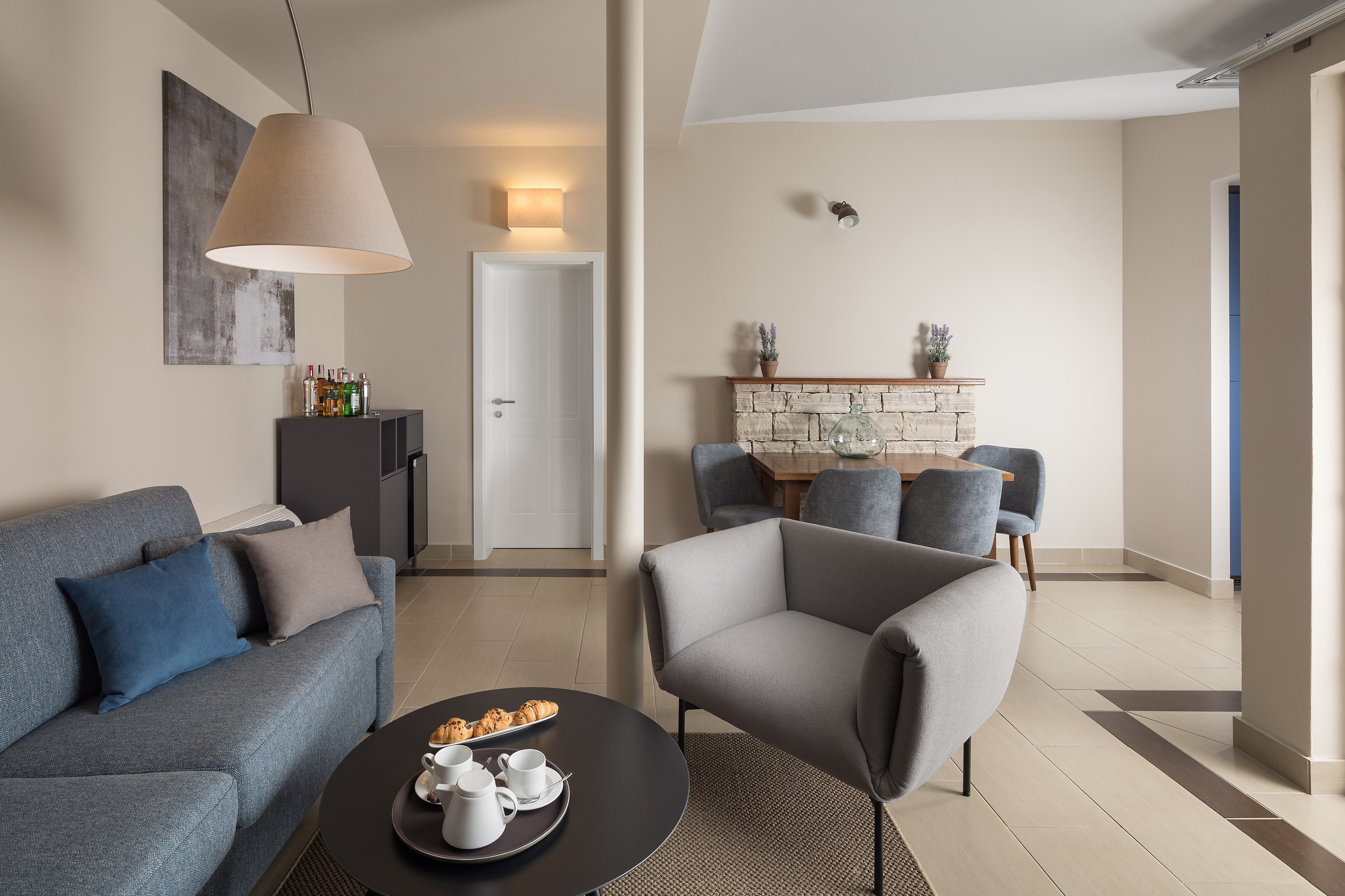 a living room with a couch and a table