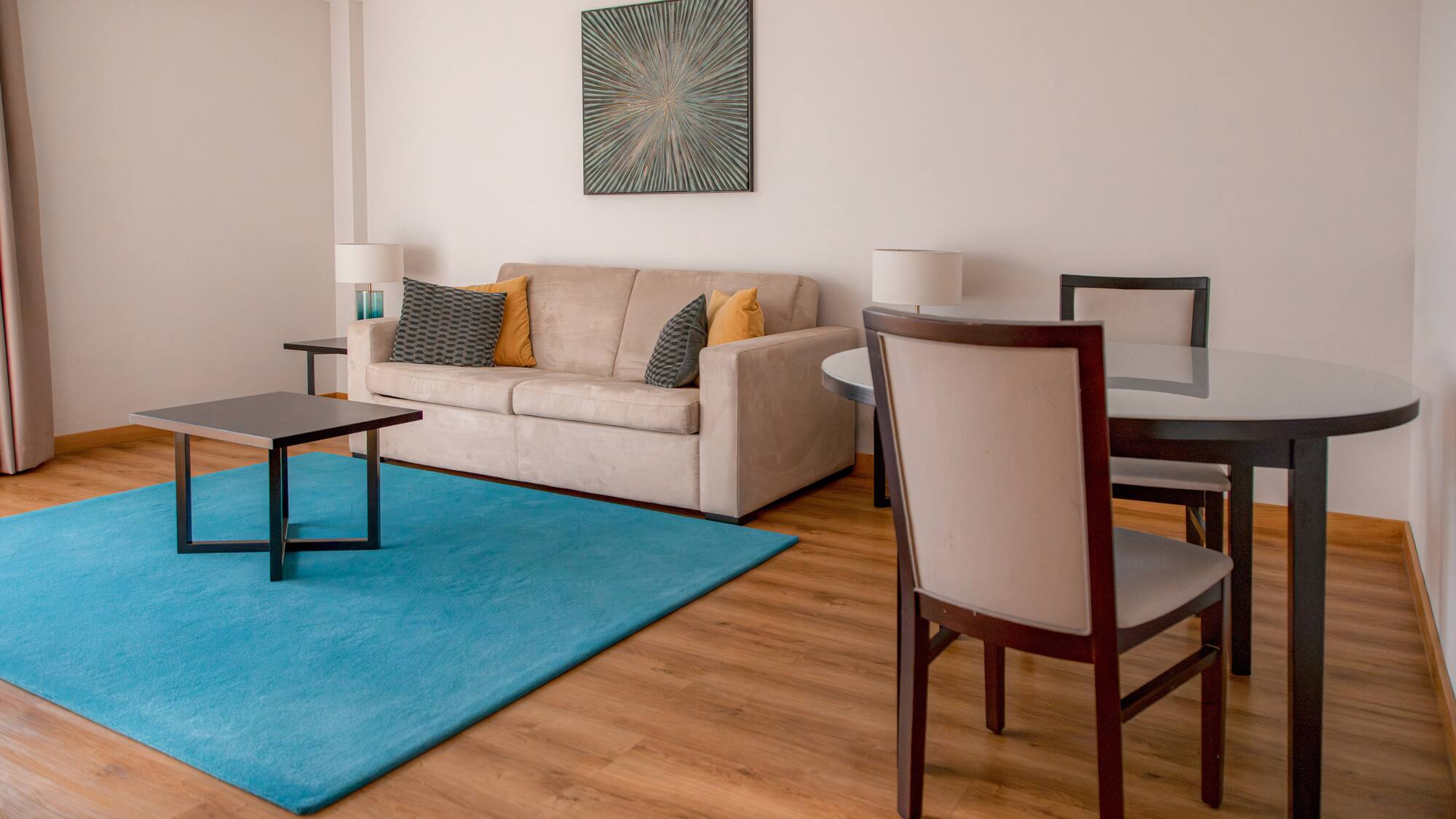 a living room with a couch and table