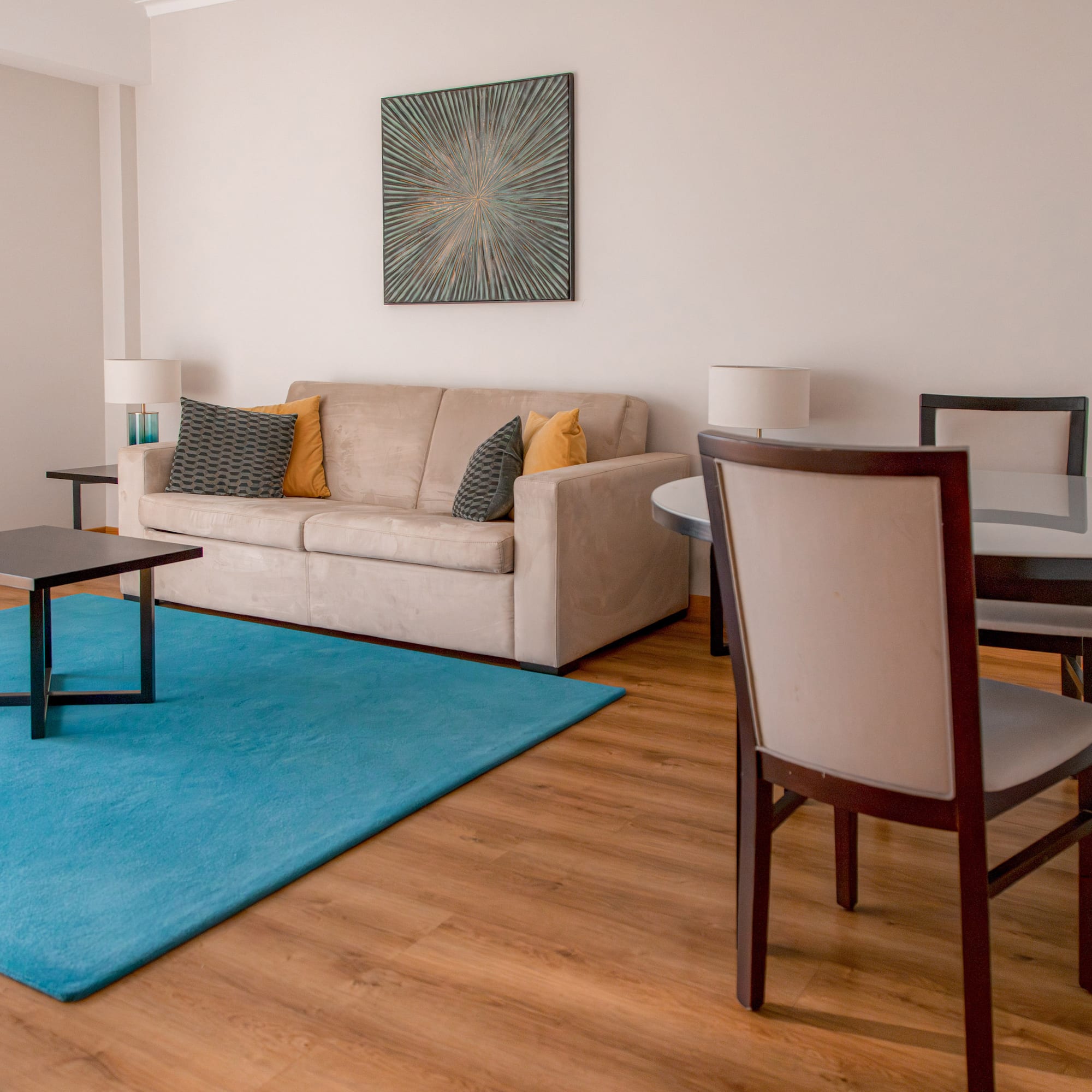 a living room with a couch and table
