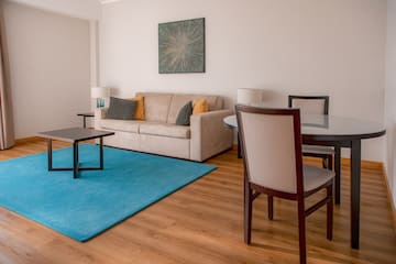 a living room with a couch and table