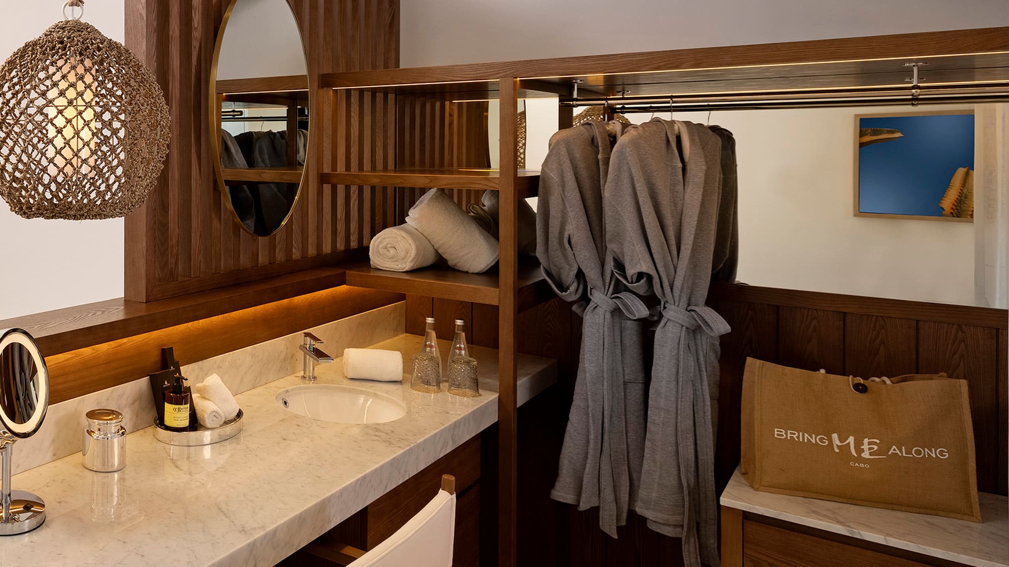 a bathroom with a mirror and towels