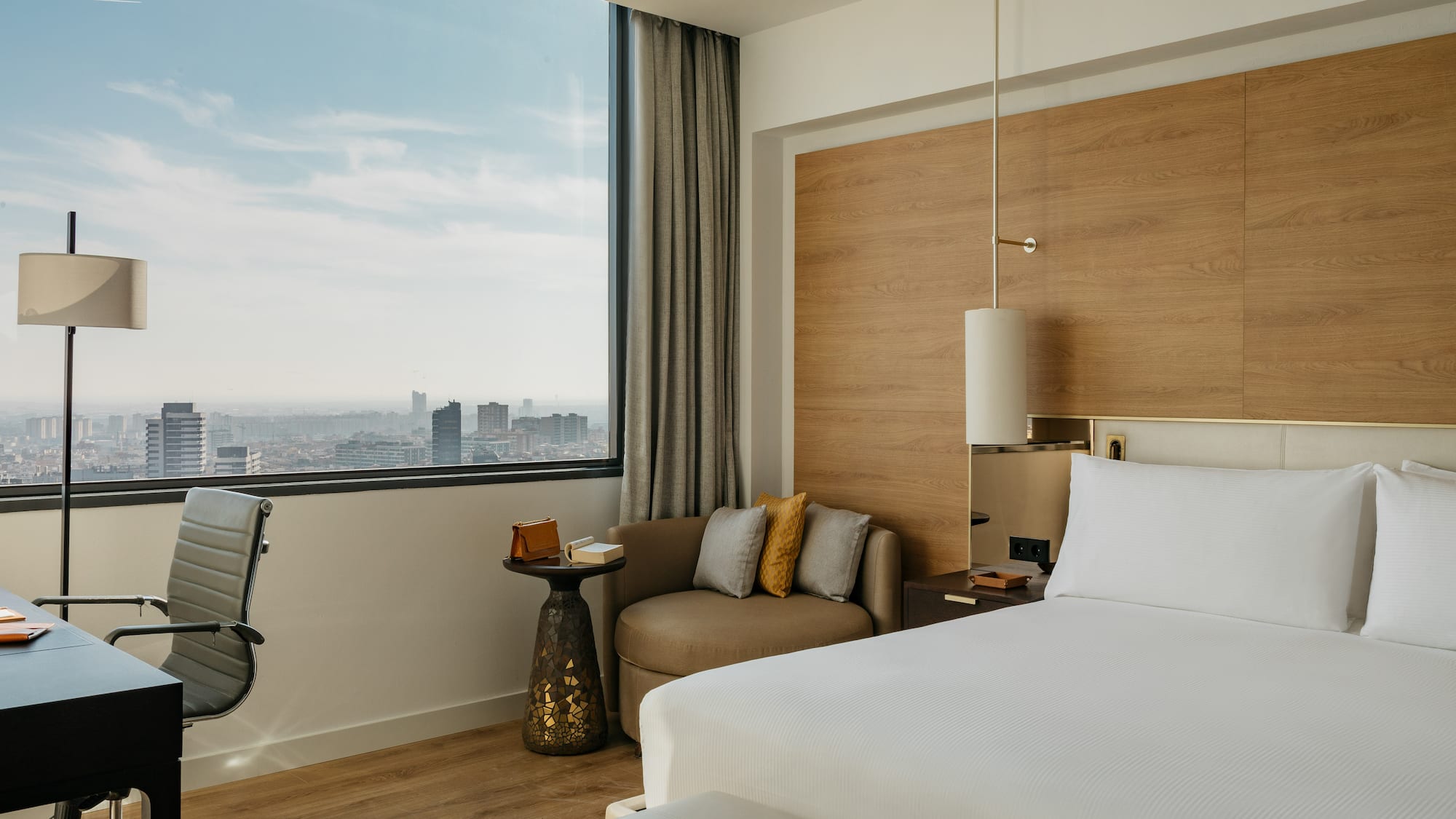 a room with a bed and a chair