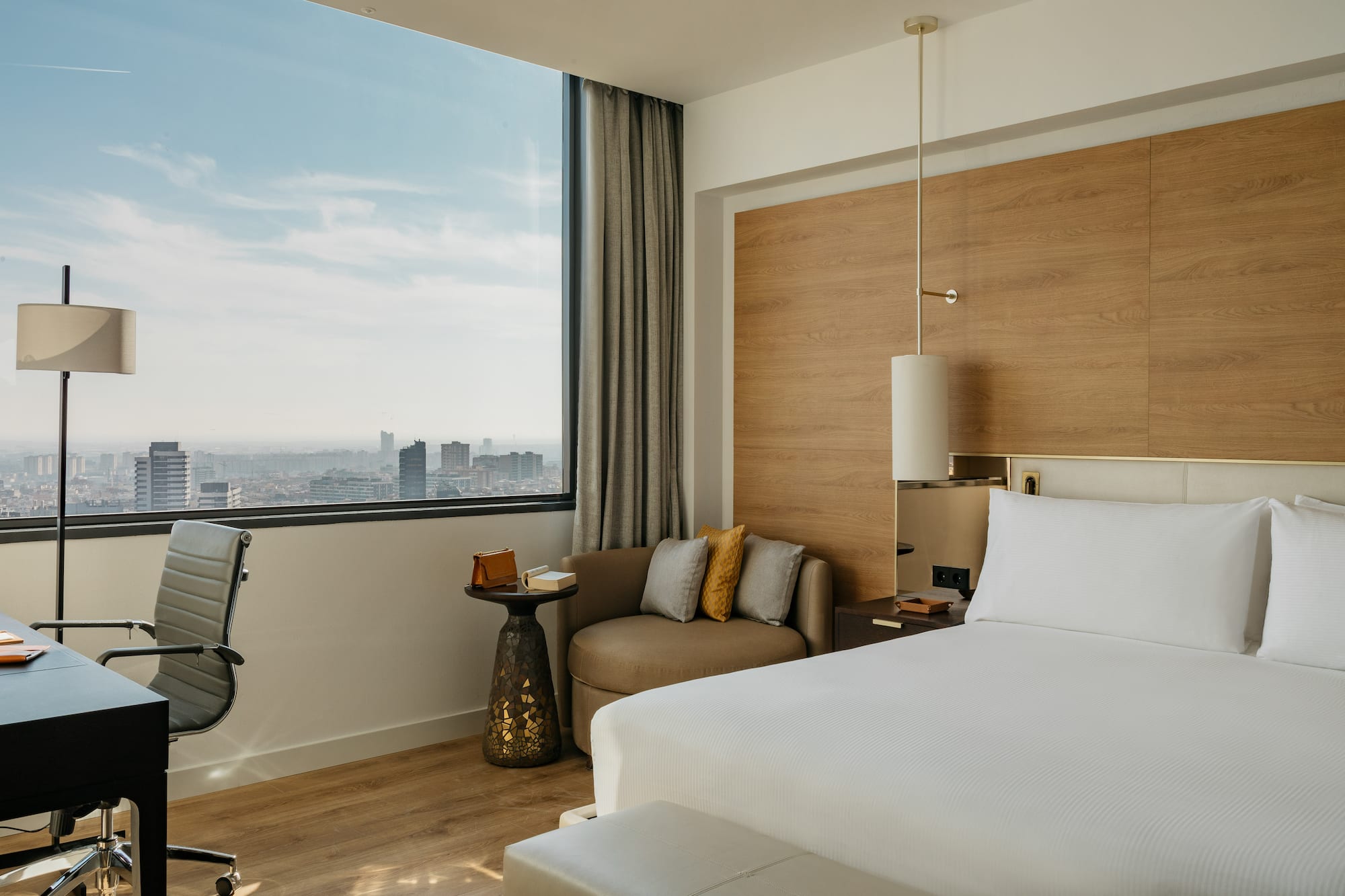 a room with a bed and a chair