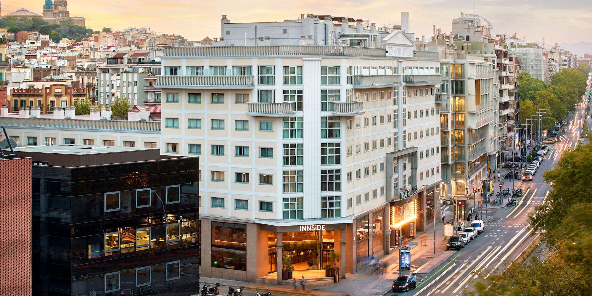 a city street with buildings and cars