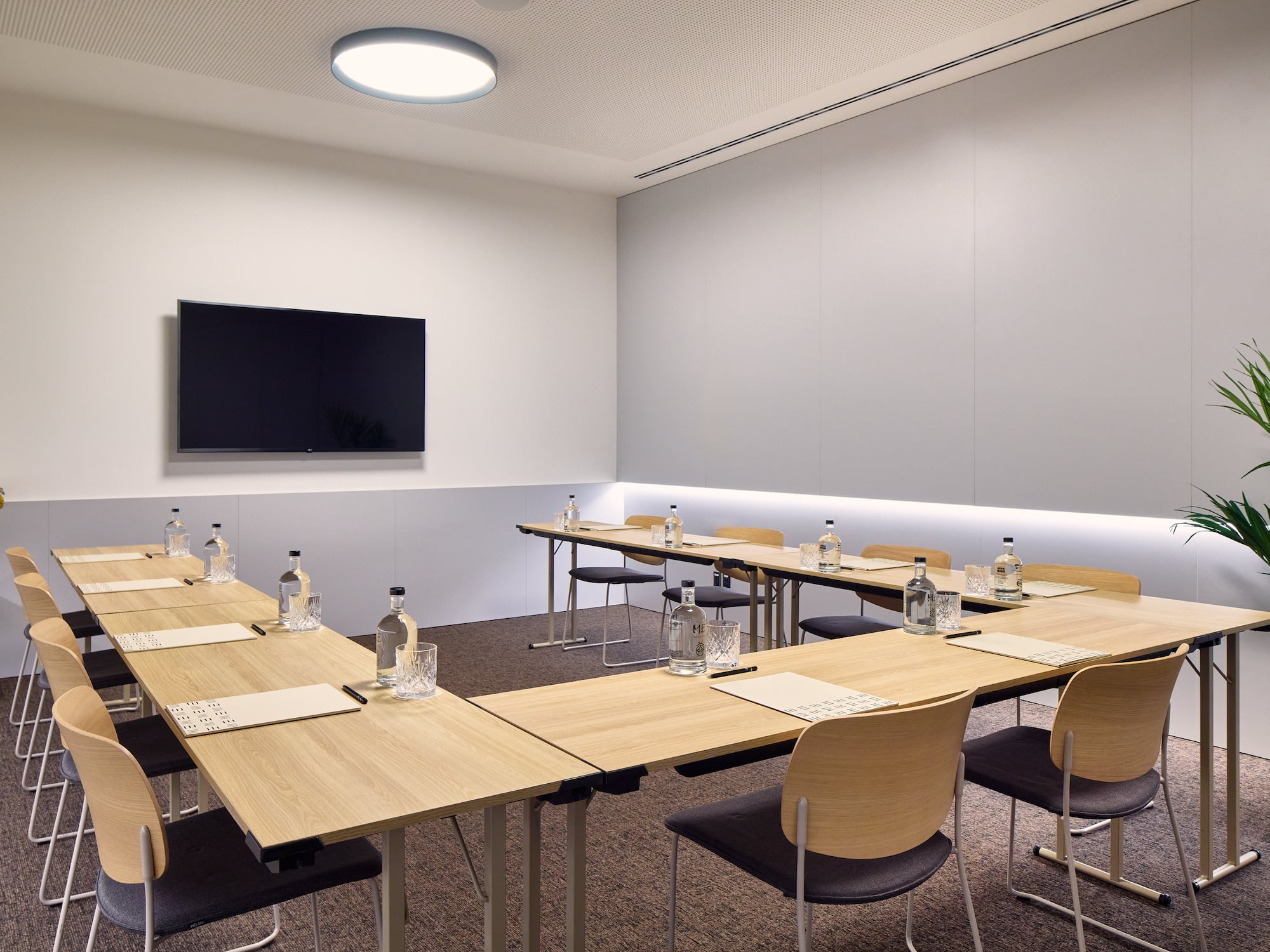 a room with tables and chairs