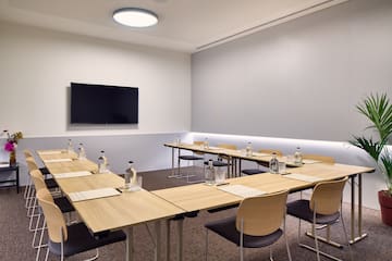 a room with tables and chairs