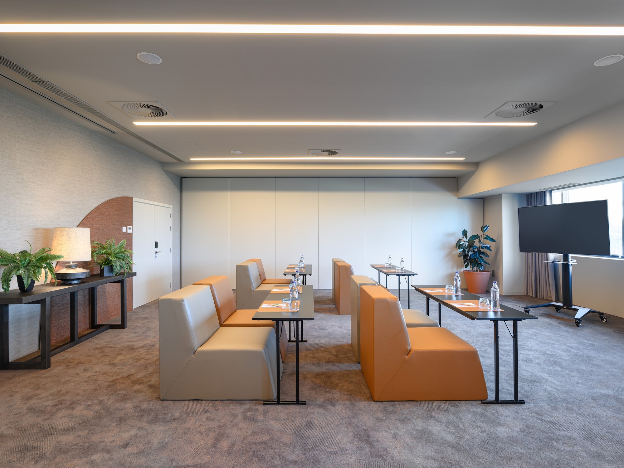 a room with couches and tables