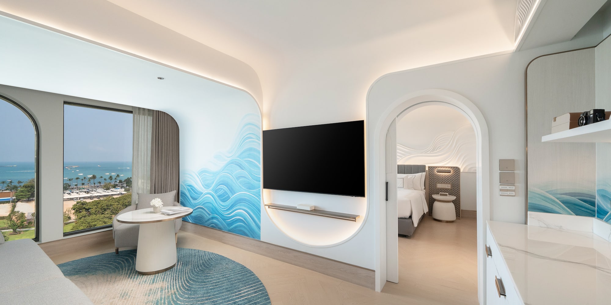 a room with a television and a table