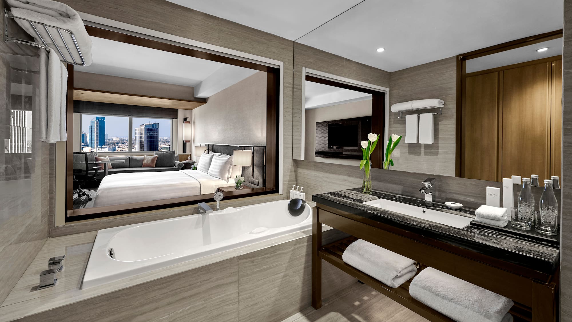 a bathroom with a bathtub and a mirror