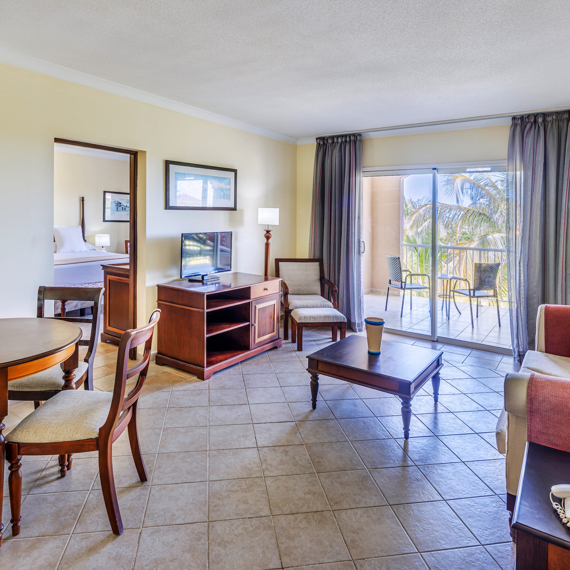 a room with a television and a table