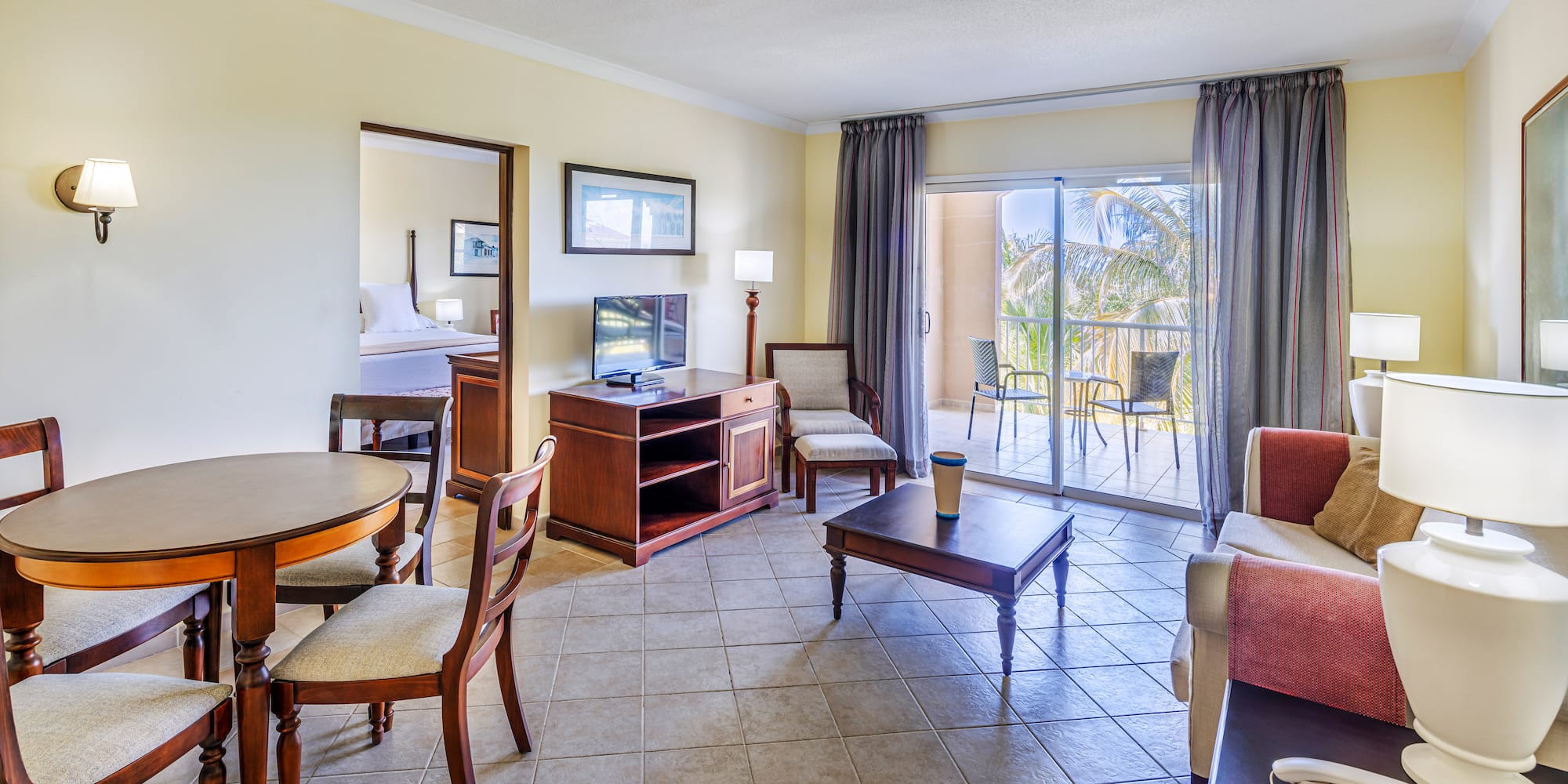 a room with a television and a table