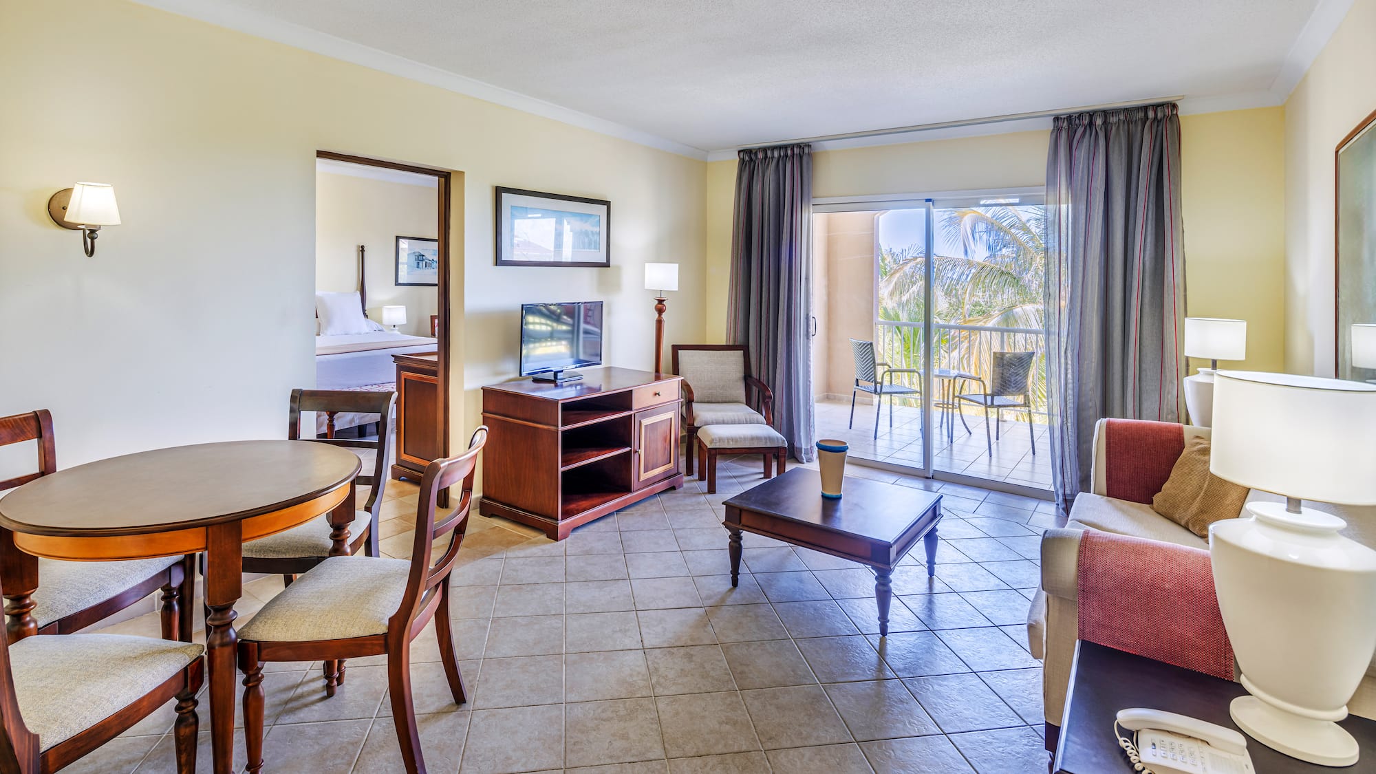 a room with a television and a table