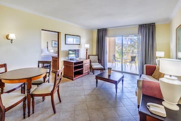 a room with a television and a table