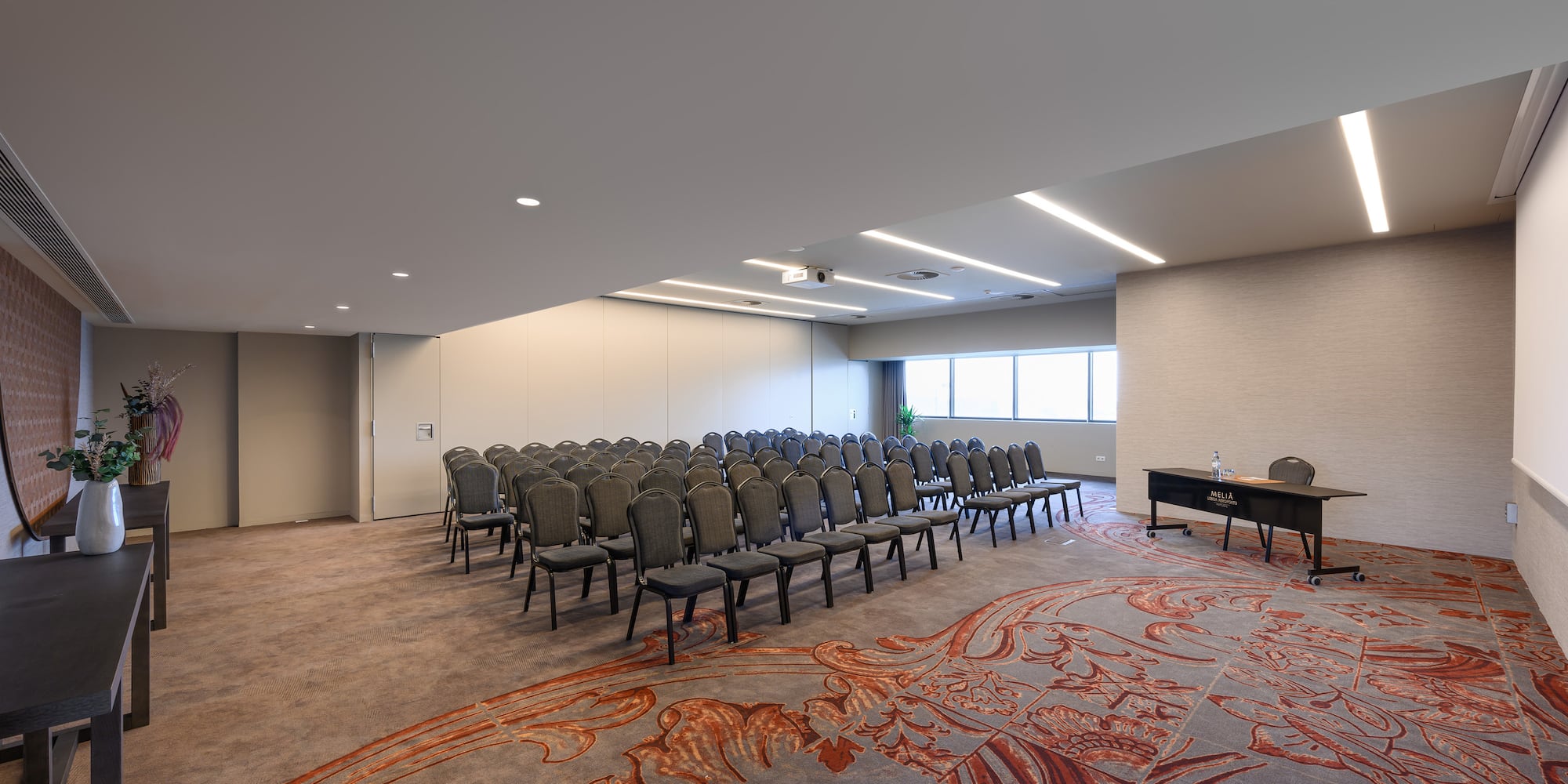 a room with rows of chairs