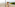Smiling girl in lemon swimsuit and boy on sunny beach with ocean.