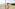 Smiling girl in lemon swimsuit and boy on sunny beach with ocean.