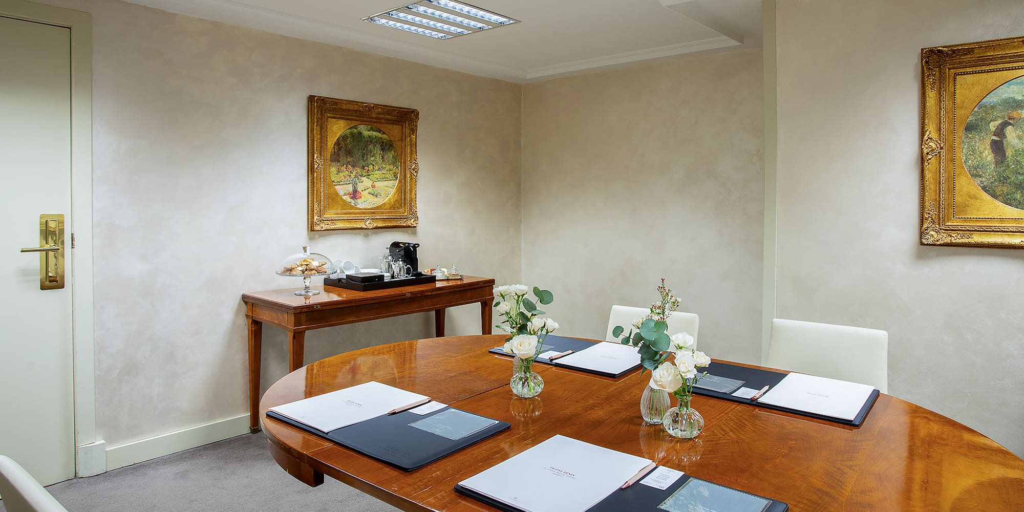 a room with a table and chairs