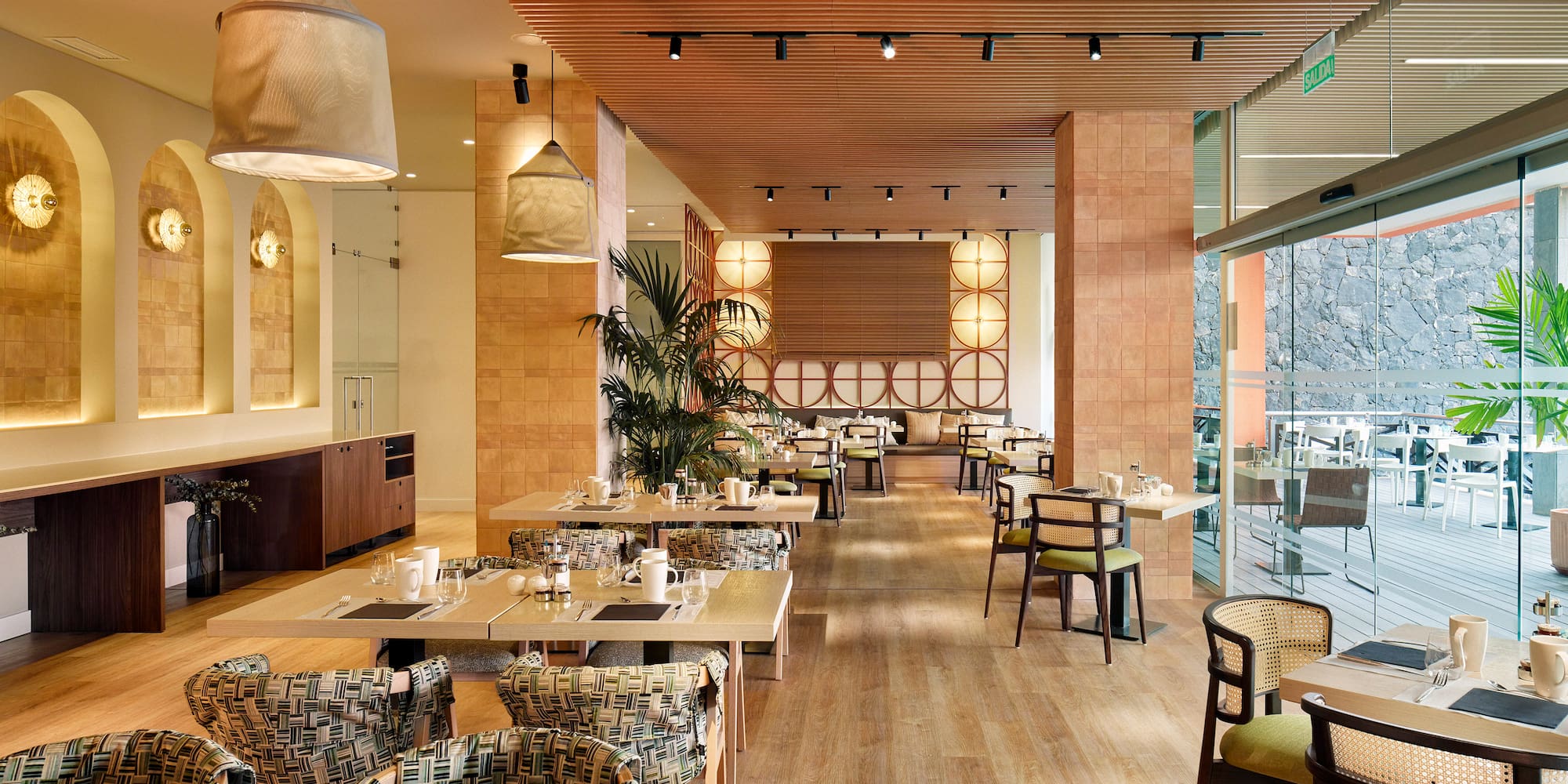 a restaurant with tables and chairs