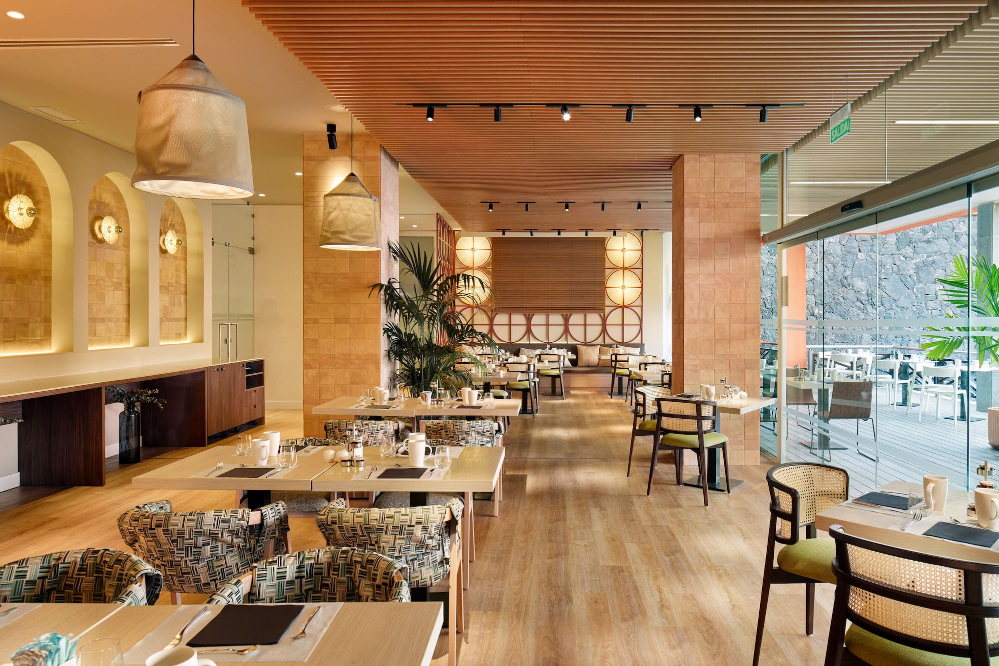a restaurant with tables and chairs