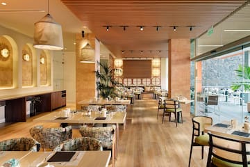 a restaurant with tables and chairs