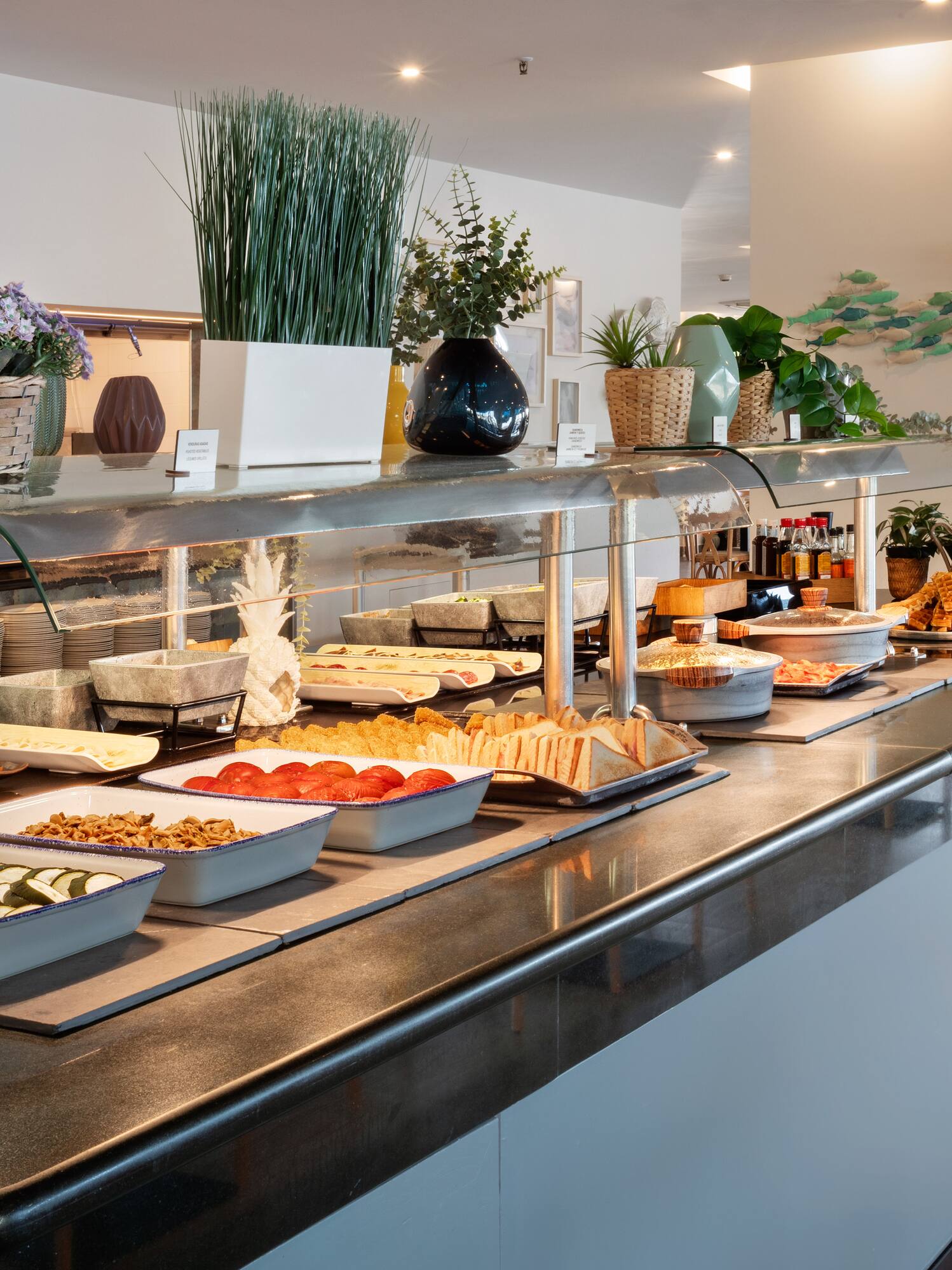 a buffet line with food on it